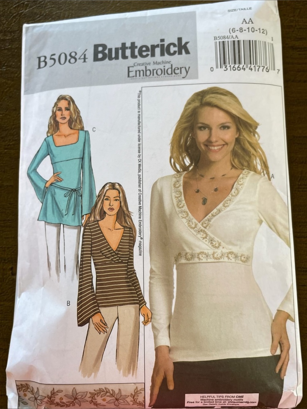 Butterick B5084 SZ AA 6-8-10-12.  Tops, tunic and belt.